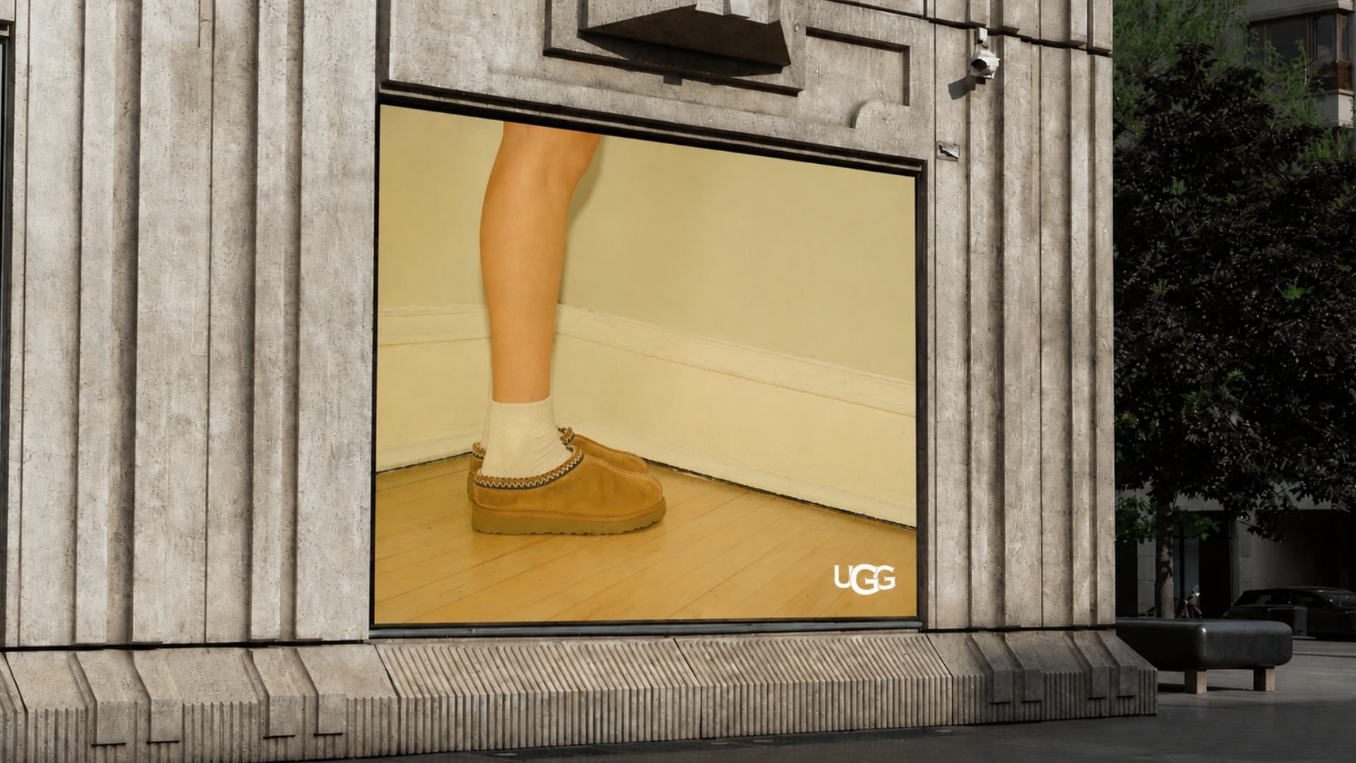 Architectural OOH window placement of a foot in a UGG slipper